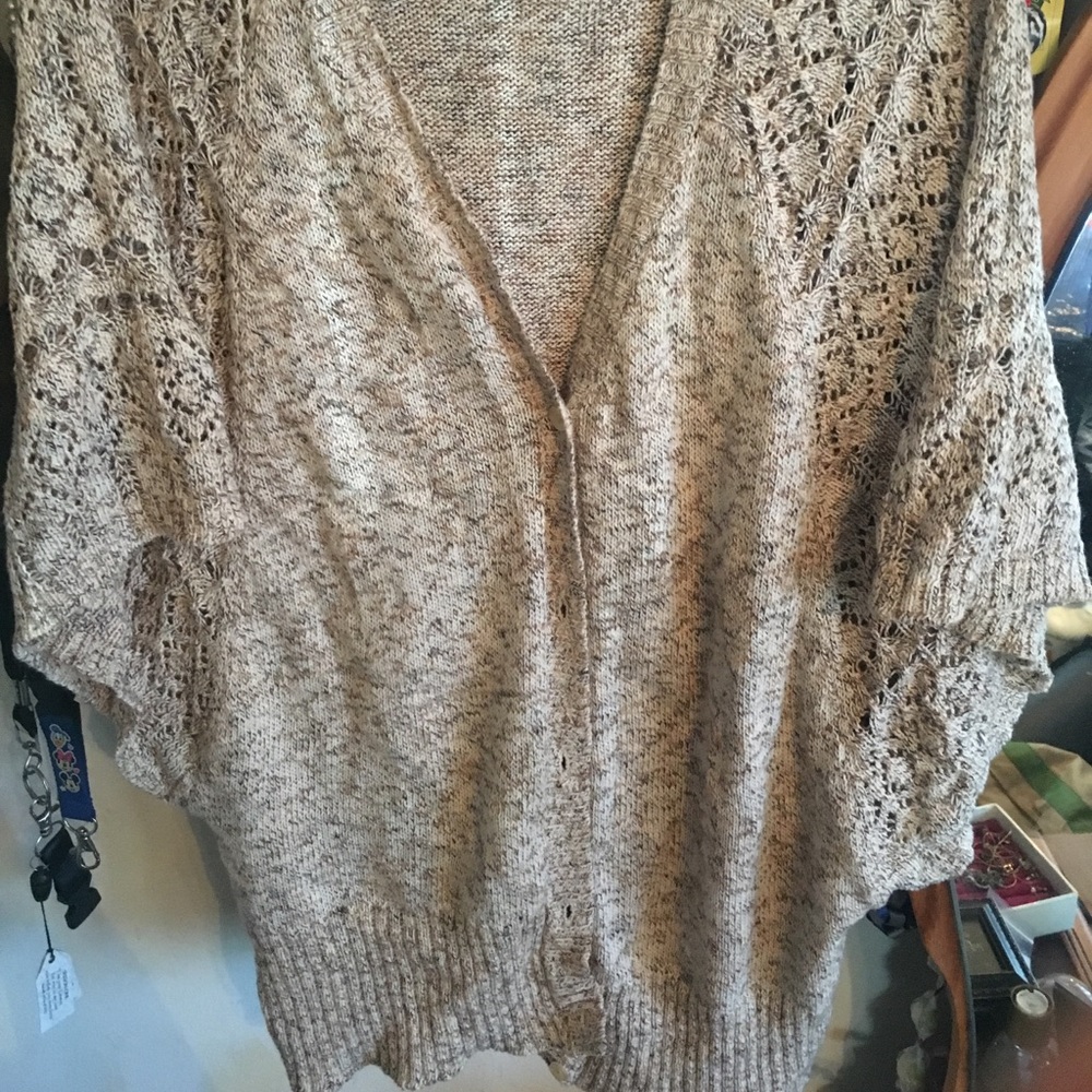 Valerie Bertinelli cream crochet cardigan